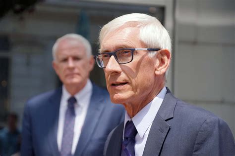 Governor Tony Evers visits Milwaukee to sign law expanding electric ...