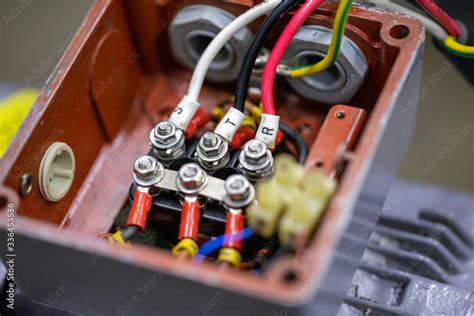 electrical cables connecting with terminal of motor in cover box of ...