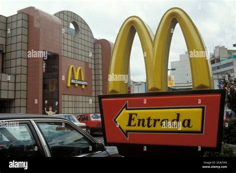 Facade and sign of modern McDonald's fast food restuarant in Mexico City. c1980s ©Bob Daemmrich ...