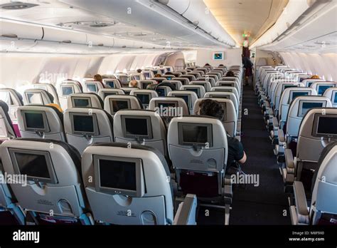 Largely empty economy cabin of an Airbus A330 Stock Photo - Alamy