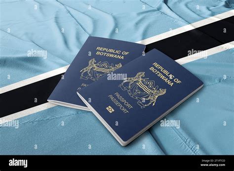 Botswana passport on its flag top view Stock Photo - Alamy