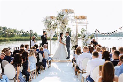 Premium Photo | Wedding ceremony of the newlyweds on the pier