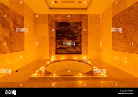 Spa room with burning candles Stock Photo - Alamy