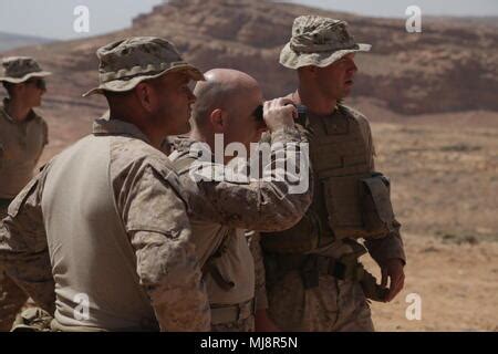 U.S. Marine Corps Col. Farrell J. Sullivan, right, commanding officer ...