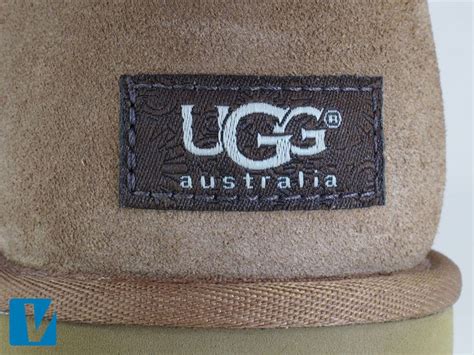 UGG boots feature an UGG label on the heel. The letters on the logo slightly overlap each other ...