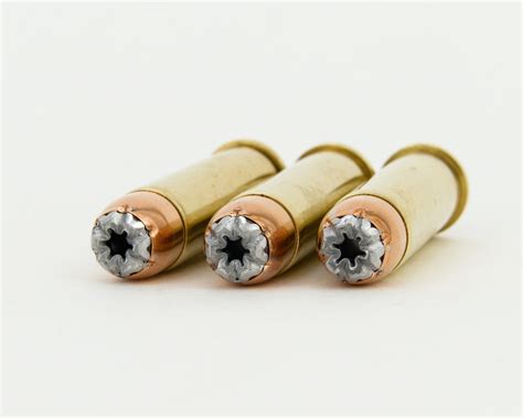 357 Magnum Hunting / Self Defense Ammunition with 158 Grain Gold Country Wolverine Serrated ...