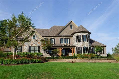 Upscale suburban house – Stock Editorial Photo © kzlobastov #11382358