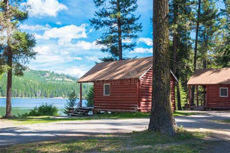 Log Cabins in Forest and on Lake Stock Image - Image of highlands, leisure: 33135705