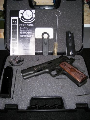 Taurus PT1911 with walnut grips in columbus, Ohio gun classifieds ...