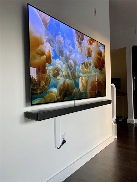 Wall install of the LG SL10R below an LG OLED CX 65”. : r/Soundbars