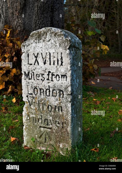 Old weathered milestone on Thruxton Village green engraved with Roman ...