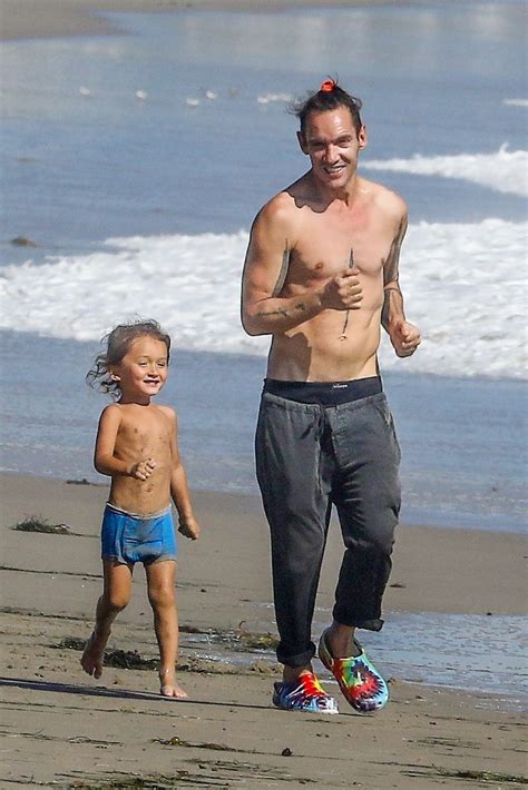 Jonathan Rhys Meyers spends time at the beach with his son