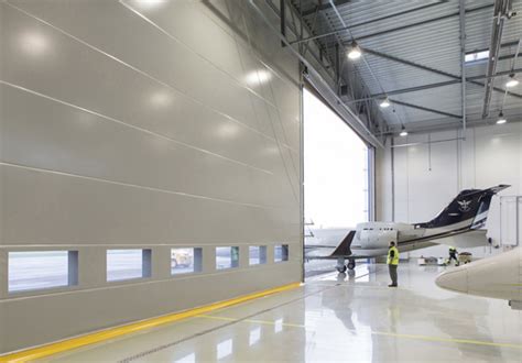 Fabric fold-up hangar doors for aircraft hangars in all size » Champion ...