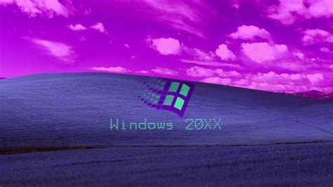 the windows logo is displayed in front of a purple and blue sky with white clouds