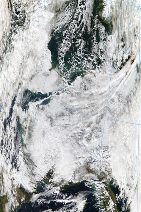 Weather Dynamics: Satellite Images of Snow Cover in Europe