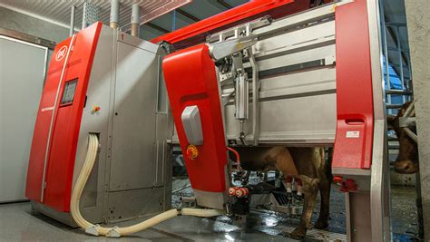 Lely unveils robotic milker and enhanced feed pusher - Farmers Weekly