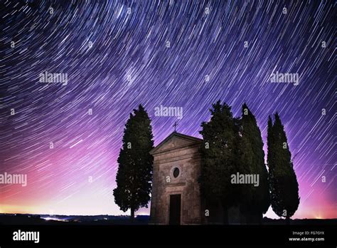 Landscape with star trails Stock Photo - Alamy