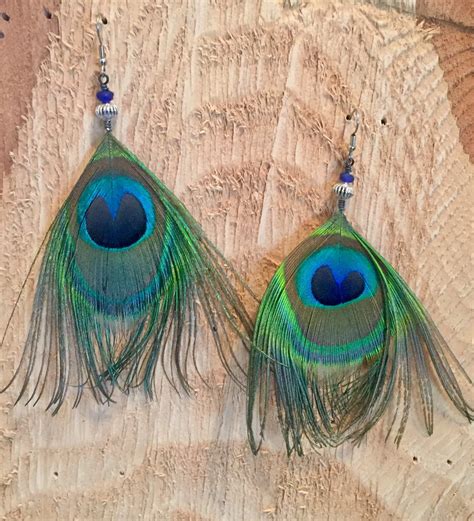 boucles d'oreille vraies plumes de paon, création unique, perles ethniques