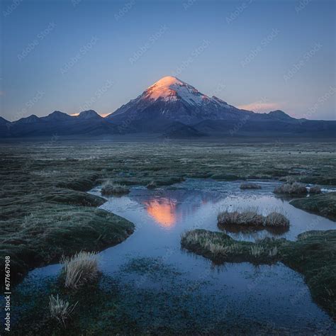 View of Nevado Sajama, an extinct stratovolcano with snow on top, Sajama National Park, Bolivia ...