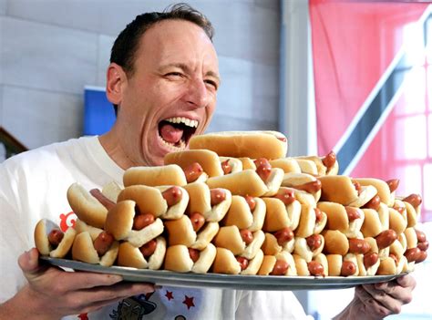 Joey Chestnut Wins Nathan's Hot Dog Eating Contest for the 10th Time | E! News