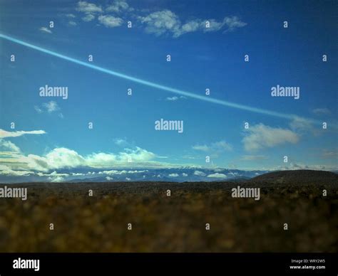 Surface Level Of Vapor Trail In Sky Stock Photo - Alamy