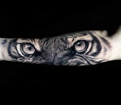 Photo - Tiger Eye tattoo by Michael Dagostini | Photo 30197 | Tiger eyes tattoo, Cat eye tattoos ...