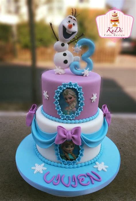 a frozen princess birthday cake with the number two on top and an image of snowman