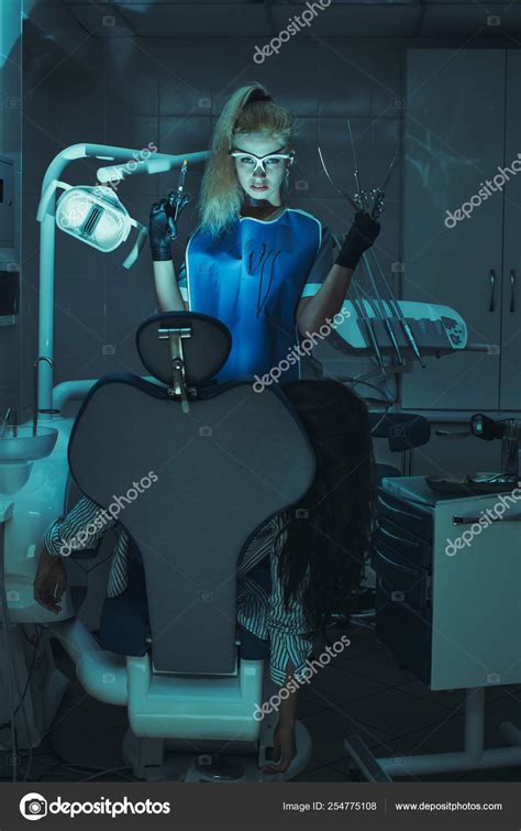 Horror scene in dentist office Stock Photo by ©dimabl 254775108