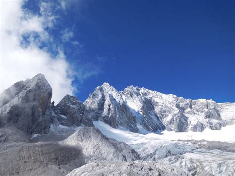 Jade Dragon Snow Mountain | Snow mountain, Natural landmarks, Travel