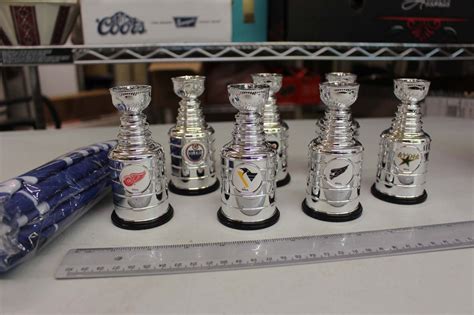 Lot of Mini Replica Stanley Cups (7)