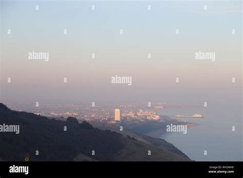 Eastbourne from Beachy Head at sunset Stock Photo - Alamy