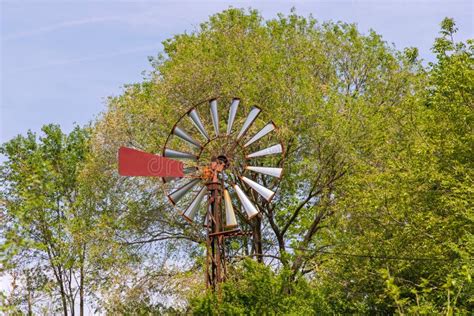 Rusty Wind Turbine stock photo. Image of branches, farm - 247050152