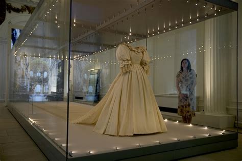 Princess Diana's wedding dress goes on display in London | AP News