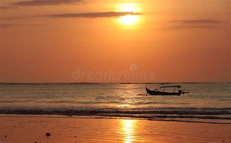 Drifting boat on a sunset stock photo. Image of blue, light - 3586180