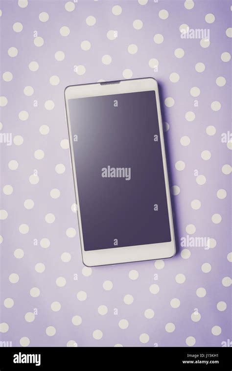 Smart phone with black screen on purple dotted background Stock Photo ...