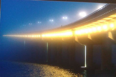 Biloxi Bay Bridge on a hazy night | Airplane view, Biloxi, Bay bridge