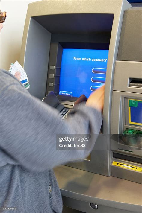 Woman Making Atm Withdrawal A High-Res Stock Photo - Getty Images