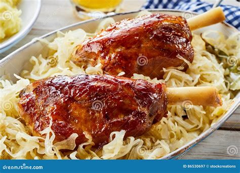 Two Glazed Pork Knuckles or German Haxe Stock Image - Image of cabbage, recipe: 86530697