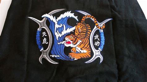 Martial arts embroidery for gi jacket back. Tiger and wave. www.Kataaro ...