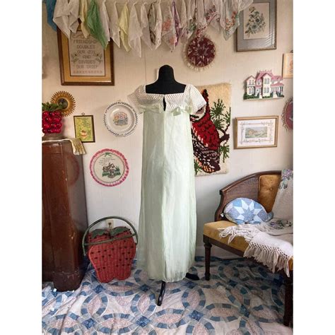 gorgeous light pastel green dress with a white... - Depop