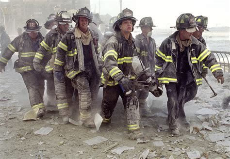 These Powerful Photos Capture The Bravery And Selflessness Of 9/11 First Responders