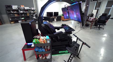 This is the craziest gaming setup we've ever seen: It has a full gaming PC, a PS4 Pro, three ...