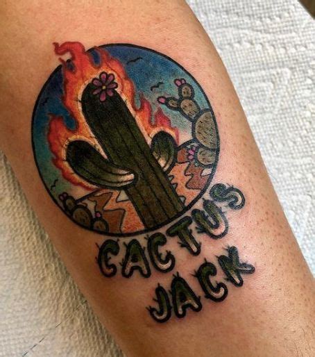 a tattoo on the arm of a person with a cactus