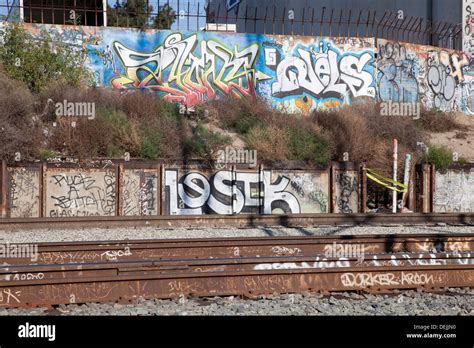 Graffiti along train tracks next to Los Angeles River, Downtown Los ...