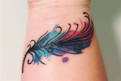Whimsical watercolor feather tattoo on my wrist by Lenny @ The Salty Siren Tattoo Lounge ...