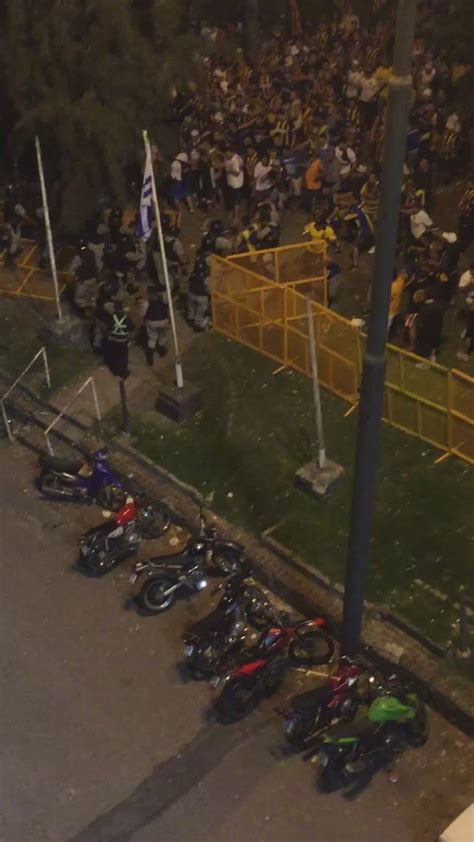 Rosario Central fans against the police before Libertadores' match in ...