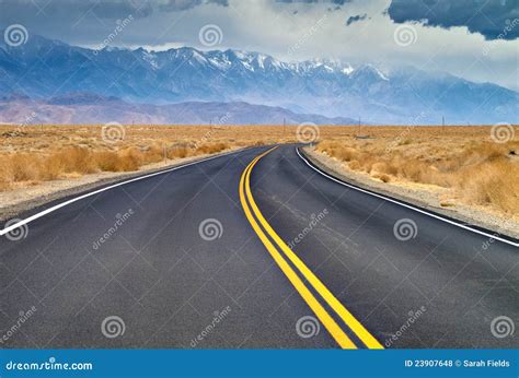 Curved Road with Mountains stock photo. Image of eastern - 23907648