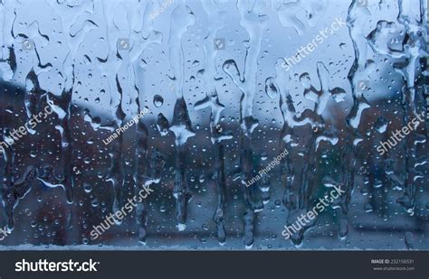 Frozen Rain Drops On The Window Glass Stock Photo 232156531 : Shutterstock