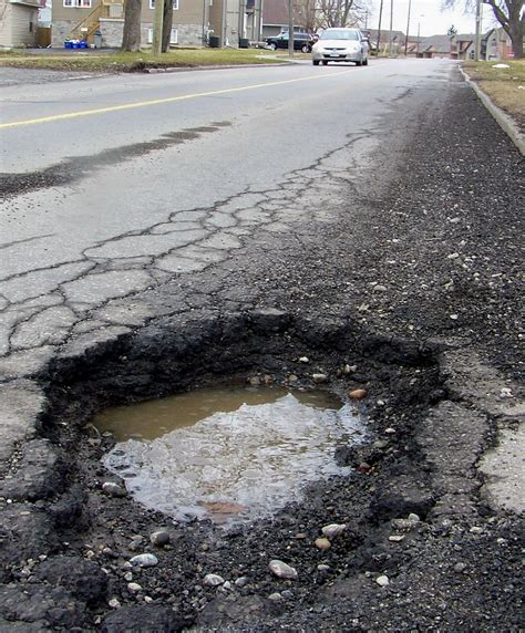 What causes potholes? - Sand Seal Paving