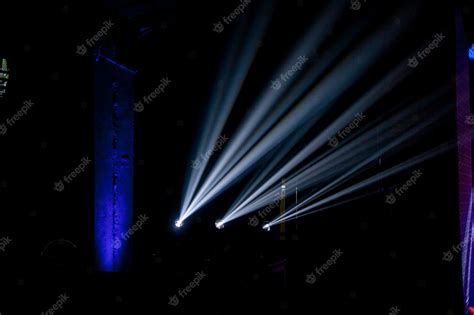 Premium Photo | Geometrical white concert lights on bright stage lights ...